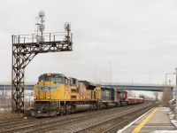 Three railways are represented as CSX run-through train CN 327 heads through Dorval with UP 8322, CSXT 4058 & CN 2851 for power.