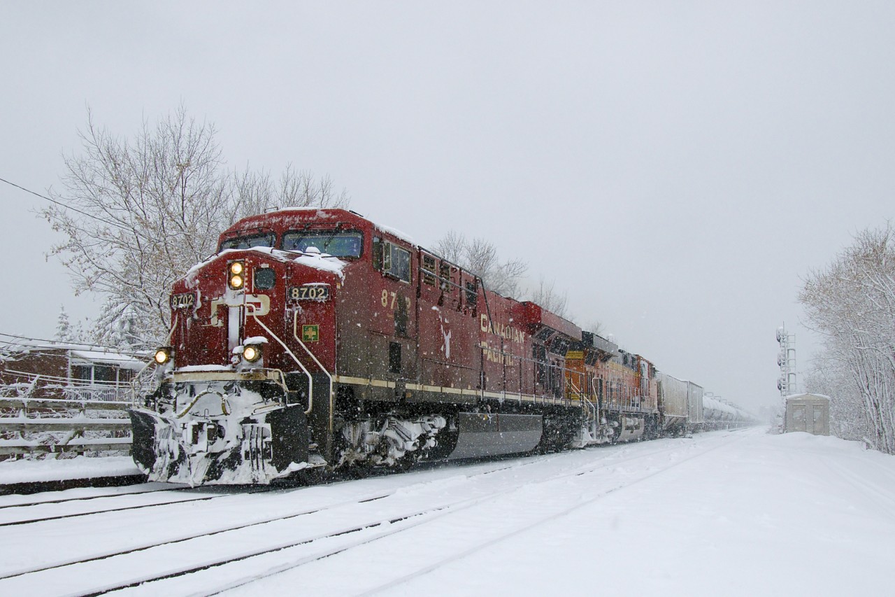 On the morning that Montrealers awoke to a decent amount of snow, CP 651 is passing Lasalle station with CP 8702 & BNSF 8150 for power as the snow continues to fall.