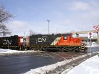 GP9's CN 7075 & CN 7226 are crossing Monk Boulevard as they do some switching on the Turcot Holding Spur.
