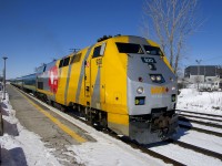 VIA 624 with VIA 920 in VIA 40 wrap is departing Dorval Station.