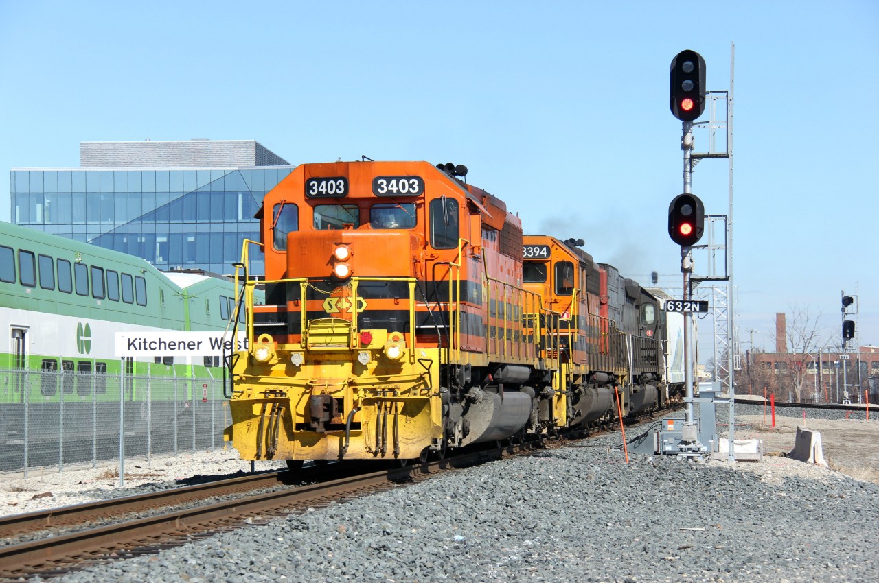 This is another shot on my bucket list - Kitchener West. This spot was visited by me numerous times, and back when I was in university, I used to come here often when the line was at grade with King Street, just to the east of this image. My goal was to get this shot yesterday but 431 got ahead of me, so I took the opportunity to grab it today. I like the improvements here - much modernization has happened on this line since Metrolinx started operating on the line with the GO service. At left, two GO train sets are parked, and there are another two east of the Kitchener station. Interestingly, the one at left is completely in the new GO scheme. Here is a shot on the east side of King St. - http://www.railpictures.ca/?attachment_id=29324. The line to the right of the photo is the Huron Park Spur, which turns into the CP Waterloo Sub south of Highway 7/8 parallel to Courtland Ave. - the CP/GEXR Interchange.