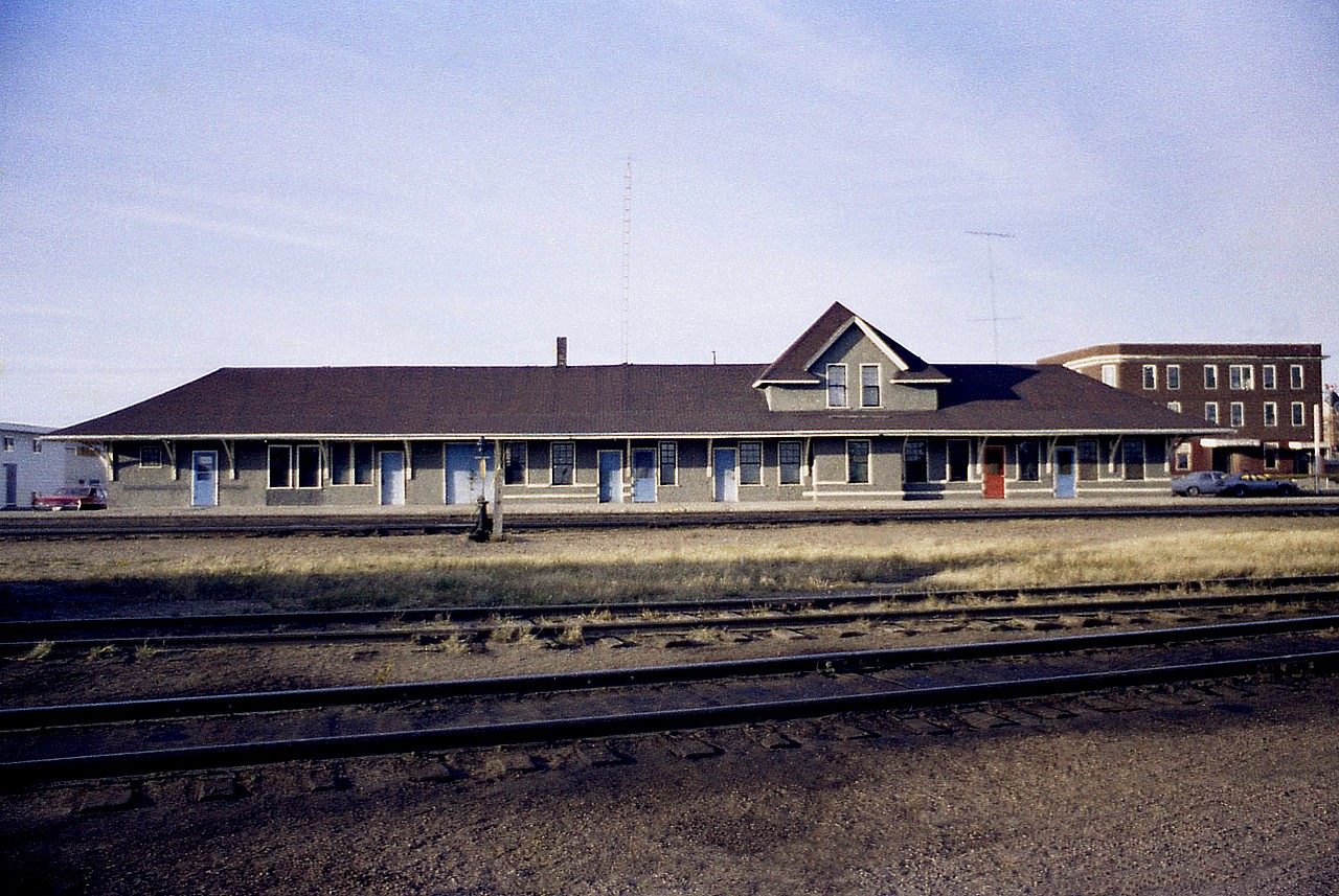 This rather large station was once the centre focal-point of the Canadian Northern Railrway (CNoR) line between Edmonton and Winnipeg.  The building was constructed in 1904 and opened the following year. CNoR then became part of today's CN, and after a few stints by VIA stopping here, the station was finally closed in 1980. It then became a historically designated structure in 1992. When I look at this image, I cannot help but wonder how much effort went into keeping a place like this warm thru the sometimes very frigid prairie winter.  Why that one red door? I don't know. :o)