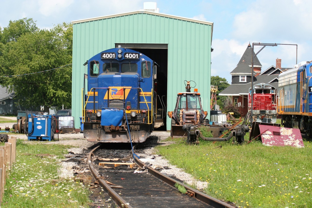 Goderich-Exeter Railway (GEXR) GP9 4001 is seen waiting to be lifted by train 581 outside the railway’s Goderich shop on an August afternoon almost ten years ago.