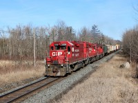 T69 is making the return trip westward with GP38AC, CP 3008 leading a pair of GP 38-2 in CP 3117 and CP 4407 after making a lift at Guelph Junction. 