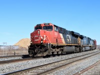 You would never know this was Canadian Pacific if you didn't know the location or notice the Station name sign as CN 2281 leads CSX 441 and CSX 4778 through Guelph Junction on a cool but bright sunny day.