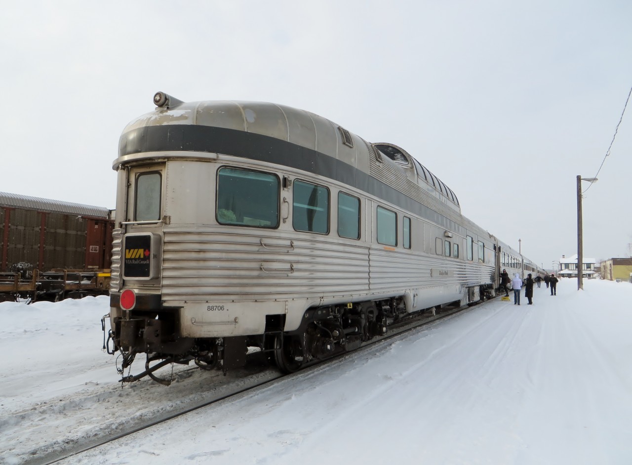 STAINLESS STEEL STOP AT SIOUX LOOKOUT. My wife Michelle and I recently travelled from Toronto to Vancouver in January on VIA Rail’s flagship train, the legendary 'Canadian'. The four day/ three night (in our case) journey included considerable time spent in the famous Dome Car and ours was the Glacier Park. One of 18 stainless steel Park cars built in 1954 for the Canadian Pacific Railway and named after a Canadian Park, this one represents Glacier National Park, located in the Selkirk Mountains of British Columbia. Obtained by VIA Rail in 1978 and with 14 others still in service, this 85 foot long 'Prestige'car has been beautifully refurbished with a downstairs lounge at the rear, a full bar-lounge in the center, and upstairs seating for 24 in the glass dome offering 360 degree viewing from the top of the train. We were blessed with an 11 hour delayed departure as it afforded us daylight views of parts of Canada seldom seen by any rail traveller such as the Canadian Shield, parts of the Prairie and most of British Columbia. In addition to the views of the passing countryside, the Canadian offers some of the finest meals anywhere from prime rib to shrimp and scallops, expertly prepared on board by the chefs in the diner. The trip was truly one of a lifetime. This image was taken at our second refuelling stop at Sioux Lookout, Ontario on January 29, 2018. The 25 minute stop allowed many of the passengers, including the photographer and his wife, to get off the train and take a look around. If on schedule, the westbound stop would have taken place at midnight.
