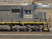 A flock of commuters speed eastbound on Highway 403 while IC 1000 speeds eastward on the Oakville subdivision. Most people tend to pan mundane things - VIAs, GOs, common leaders, and panning on cloudy/crummy days (which is good technique, mind you) but I believe you should pan the interesting - and even on a sunny day like this. Making your pan stand out is easy if you just choose the right subject, right? Built in 1995 the class leader of IC's Standard cab SD70 order is certainly interesting, for 18 years after the merger it still retains its original paint. I can think of many ways to improve this shot but it'll be a long time before I see another IC leader to take another crack at it. In a sea of mundane Dash 8s, Dash 9s and Gevos this is much more preferable of a subject to my tastes. - Steve