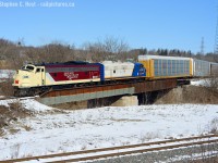 OSR's Woodstock turn is crossing the Thames River in Ingersoll over a bridge built by the Tillsonburg Lake Erie and Pacific around 1910, this was basically the start of the St. Marys subdivision (called SNS Ingersoll North).It would appear CN has since taken ownership of this bridge as the repairs to the bridge were made by CN <a href=http://www.suncalc.net/#/43.0448,-80.8764,19/2018.03.07/16:07 target=_blank> (See CN Signage on Google Street View here) </a> <br><br> On my way to Sarnia I found OSR working, and heading to the CN - I knew right away I had to stick around for the above shot so my Family and I spent an hour waiting for it. This is a rarity and here's why: To shoot a train from this side, in sun, you only have a couple hours around the noon hour to get it - and of course by summer this angle is only doable  during *high sun*. Then you need OSR to run to CN to grab cars on the day shift, also somewhat rare, but happens as needed. But this isn't the CAMI job - it may as well be: Woodstock turn, due to a shortage of cars from CN (Sound familiar?) is now running as the CAMI switcher as needed as well as the usual Putnam/Woodstock turn. CAMI was EMPTY when I drove by looking for these guys, not a single autorack in the facility - I wondered if the plant is on shutdown or strike - nope, it's not, crews informed me CN is short delivering cars for loading.<br><br> On Saturday OSR ran the 1000 Woodstock Turn to CAMI to grab a dozen or so racks, spot them at CAMI, then run light power to CP to grab more autoracks and spot them at CAMI in the late afternoon. The CAMI job is basically abolished for now, but this could change very quickly. I didn't follow OSR for too long as I had to get to Sarnia - but don't they make it look good with this motive power? I can't get enough of it. So get this shot while you can - once OSR returns to normal it will be a difficult one to get. <br><br>After the photo and a couple more I treated my family to A&W - the Ingersoll A&W - an excellent and well run franchise for those who visit the area.