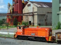 I've had an affinity for Hamilton's industrial core since I arrived in 1988 and wouldn't you know I spent quite some time in the last decade and change hunting (sometimes just driving through) for activity and toting my camera for rail and non rail action. With mixed results, some hunts went well, some not so well, but this was the ONLY time I was able to find Stelco units in action before US Steel repainted all of their equipment.<br><br>I posted <a href=http://www.railpictures.ca/?attachment_id=6920 target=_blank>another view</a> of Stelco #84  a few years ago (With  minimal processing - this photo is what happens once you learn how to process!) and <a href=http://www.railpictures.ca/author/stuart-streit target=_blank>others such as Keith Maccauley</a> have done the same, even Doug Page photographed #84 <a href=http://www.railpictures.ca/?attachment_id=28398 target=_blank> in 1959 on delivery (Built 11-59 - per TSG).</a> Number 84  has lived its entire life within the confines of this facility in the employ of Stelco. But guess what? This is kind of a swansong, hopefully proven false, because rumours swirled that Stelco would switch to trackmobile, and guess what, I am told they are now using a trackmobile. The fate and future of Stelco's GMDD SW's are now in the hands of the infidel's performance - I have my doubts if Stelco returns to life that it'll hold up - nearby CN Steel Centre switched from Trackmobile to <a href=http://www.railpictures.ca/?attachment_id=20713 target=_blank> SW 1200 7304</a> in 2015 and the trackmobile was SLLLOOOWWW. We're now going to wait and see what happens.. if any of these units leave the property.. don't hold your breath for the return though.