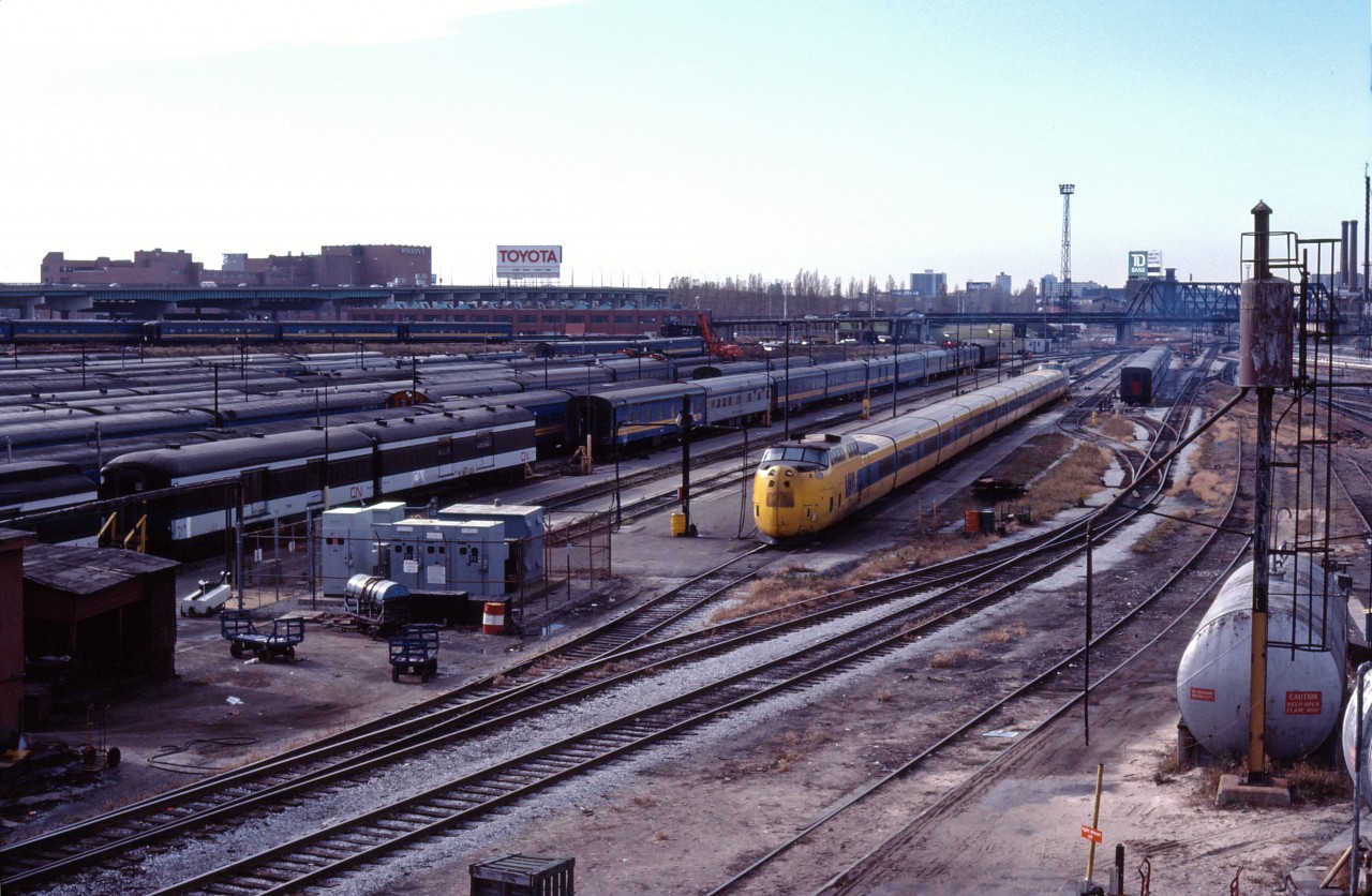 An unidentified VIA Turbo rests in Spadina coach yard in March 1982. At the time, LRC trains were being placed in service and the Turbo made its last run October 31, 1982 on Toronto-Montreal train No. 68. Of course, the Rogers Centre/Skydome and condominiums now occupy the former site of CN/VIA's Spadina facilties.