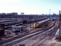 An unidentified VIA Turbo rests in Spadina coach yard in March 1982. At the time, LRC trains were being placed in service and the Turbo made its last run October 31, 1982 on Toronto-Montreal train No. 68. Of course, the Rogers Centre/Skydome and condominiums now occupy the former site of CN/VIA's Spadina facilties.