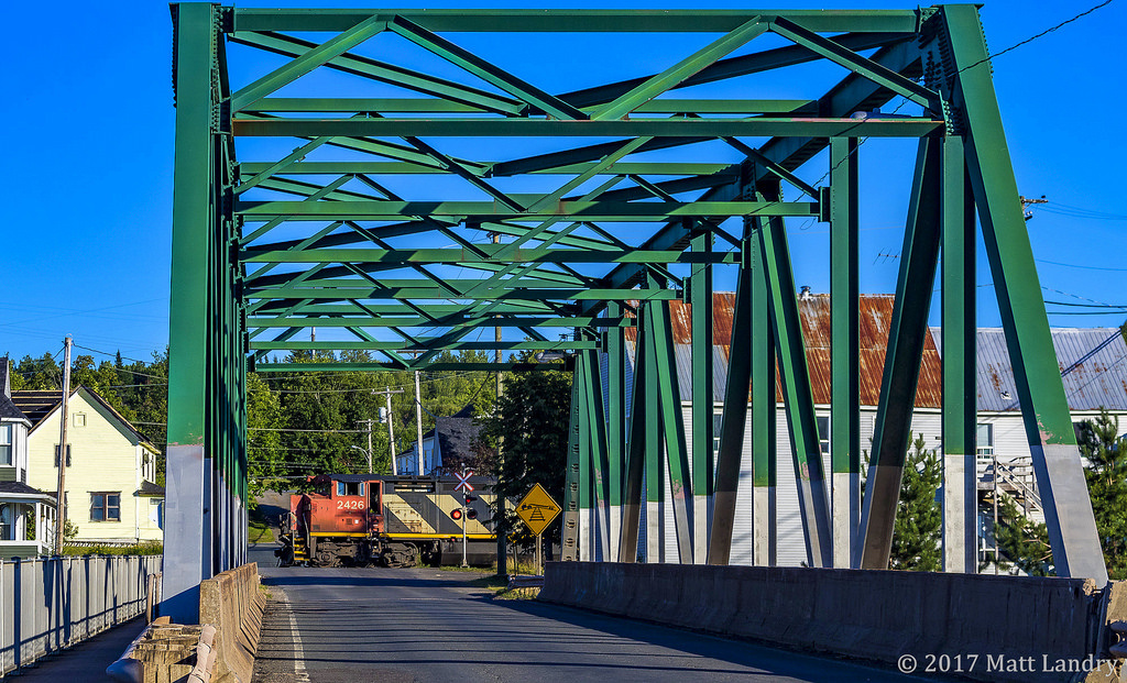 A CN Cowl leads eastbound train 406, as they head through "downtown" Norton, New Brunswick on a nice summer's evening.