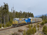 I could get used to all of this lease power! CREX ES44AC 1524 and GECX ET44AC 2033 lead 95 empty autoracks west on CN's Robson Subdivision between Peterson and Lubin. The auto business in Western Canada has been booming lately and it's been quite common to get solid auto trains in both directions a few times a week. Now if only we could get CN to identify them properly!