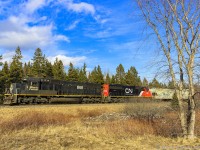 IC 1010, along with CN 5480, leads train A406, as they rumble by Passekeag, heading towards Saint John, New Brunswick. Not too often a nice lashup like this makes it to my area. 