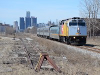 VIA 6436, heads East out of Windsor, on train #76, at VIA Station sign George Ave, former Yard area of CN, with interchange with Essex Terminal Railway. In the foreground, you can see the ETR lead, to connect the mainline to the Hiarm Walkers line, along the former CN Chatham Sub.