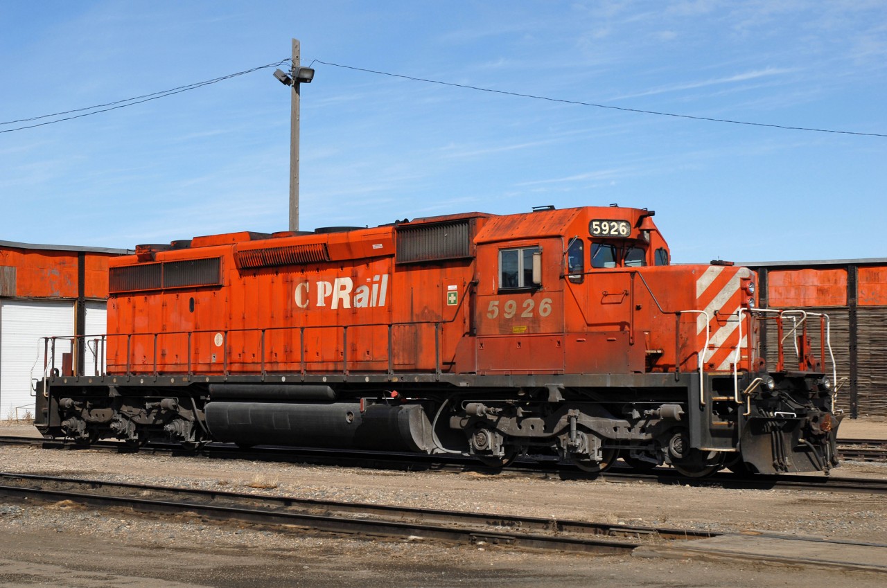 Old workhorse CP 5926 rests in the sun at the diesel shop in CP's Sutherland yard. The lettering on the side of the long hood is somewhat unusual and bares some resemblance to the lettering applied to the handful of 5300's the railway re-acquired in 2000.
