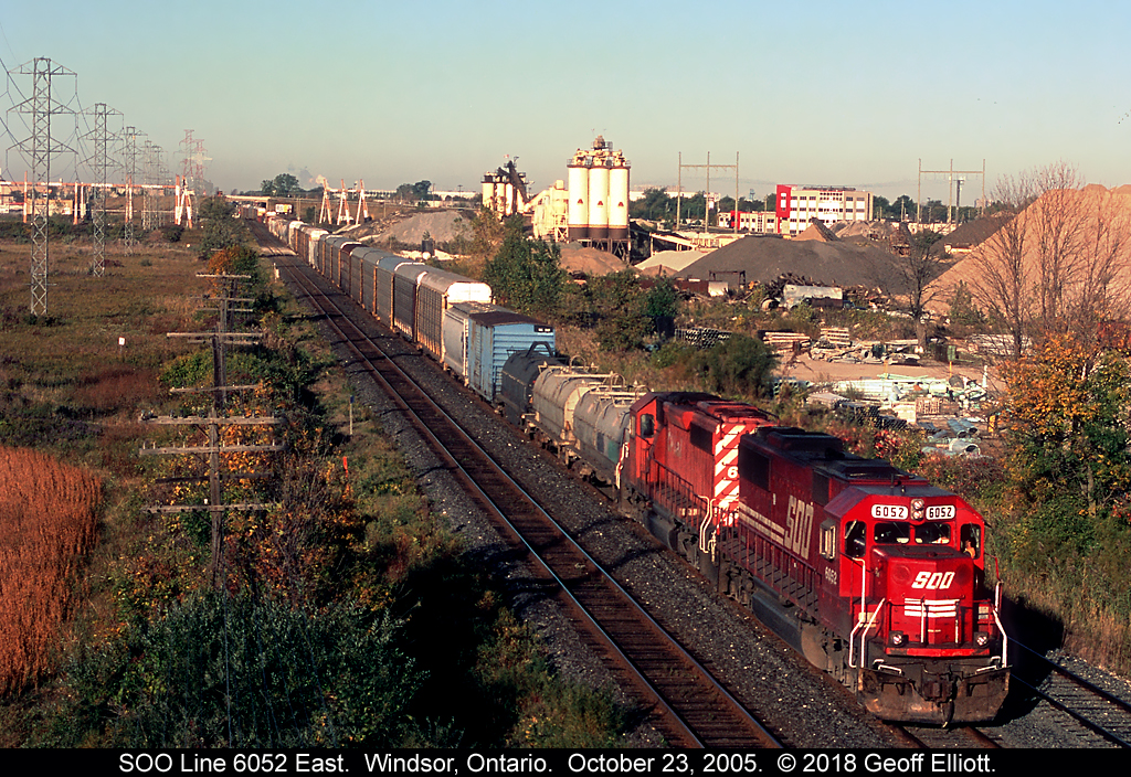 SOO Line SD60 #6052 leads an eastbound through the siding at Walkerville (Windsor), Ontario back on the morning of October 23, 2005.  I miss the SOO units as well as the SD40-2's like the trailing unit.  Never thought that I would ever say that after seeing SD40-2's on parade during the 80's and early 90's.