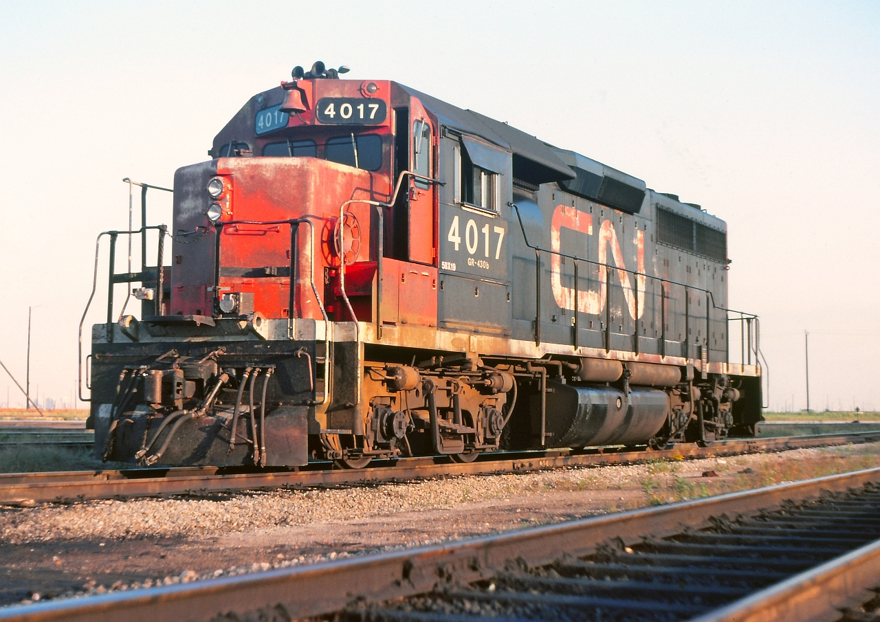 CN 4017 seen here on an August evening on the shop track at Toronto yard. Looking a little worn and will be re-numbered in the next year so to 9317 and hopefully a fresh coat of paint along with the new number.