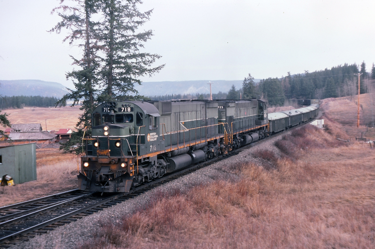 Early morning meet at Mackin. Train No 38, the "OV" symbol on the last few miles from Prince George to Williams Lake BC. Appears that they made a substantial pickup of copper concentrate, loaded in covered gondolas at Gibraltar. The crew will change off at Williams Lake and the train will continue on over two more subdivisions and terminate in North Vancouver. I was on the north bound "VO" from Williams Lake to Prince George and will return later that evening on the OV and perhaps have a meet here again the next early morning. On the left is Springfield Ranch and beyond that is the Fraser River.