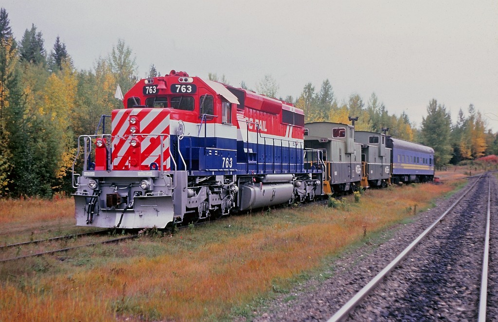 Early morning at Cotwood, working a Geometry Car from Williams Lake to Prince George. The 763 is all shiny and new, having been on the property only a month or two.Note the white flags, denoting that we were operating as a "Work Extra". Most likely we had taken the siding here for a meet with the southbound passenger train. With our work authority we could back out of the siding and test the main track northward from the south switch. Cotwood was a short 600 foot long siding, rarely used although it did come in handy for meeting the Budd Car.