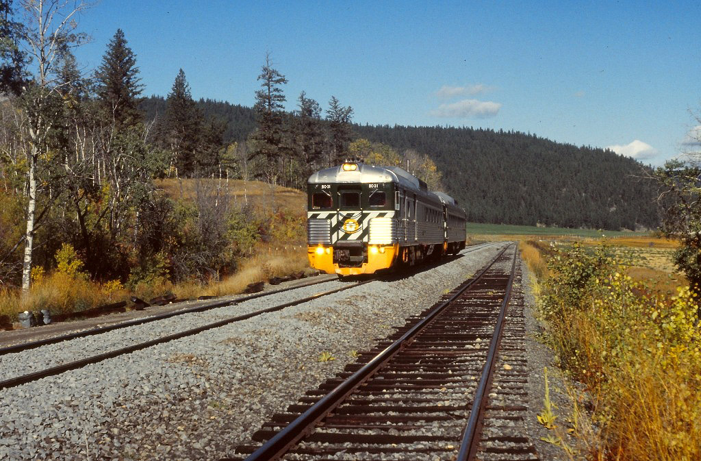 train No 2 with the BC 31 leading at Onward siding. This train is heading to Lillooet where it will combine with two or three more RDC's and continue to North Vancouver. Evidence of a major MoW project with fresh ballast, ties and perhaps new CWR being installed.