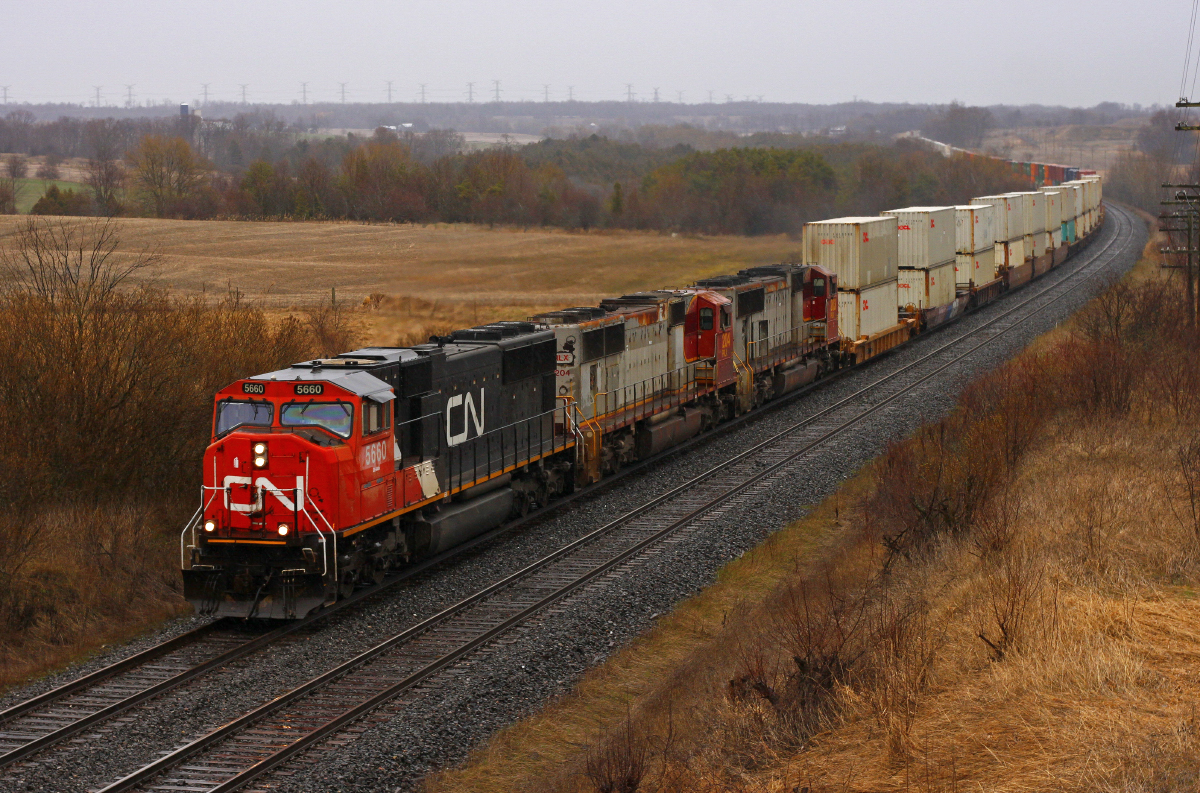 These days, CN is throwing whatever moves into a consist. This day was no exception as 5660, PRLX 204 and PRLX 203 pull 149's freight towards Toronto. The SD75 variant trio was certainly a sight to see and sounded fantastic!