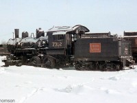 CN Stratford shop engine 7312 (an 0-6-0 built by Baldwin in 1908 for the Grand Trunk Railway) is pictured just removed from service in March 1960. 7312 would soon be sold to the Strasburg Railroad in Pennsylvania for tourist service, where it acquired the number 31. It is still in service today, restored to its previous CN number 7312.