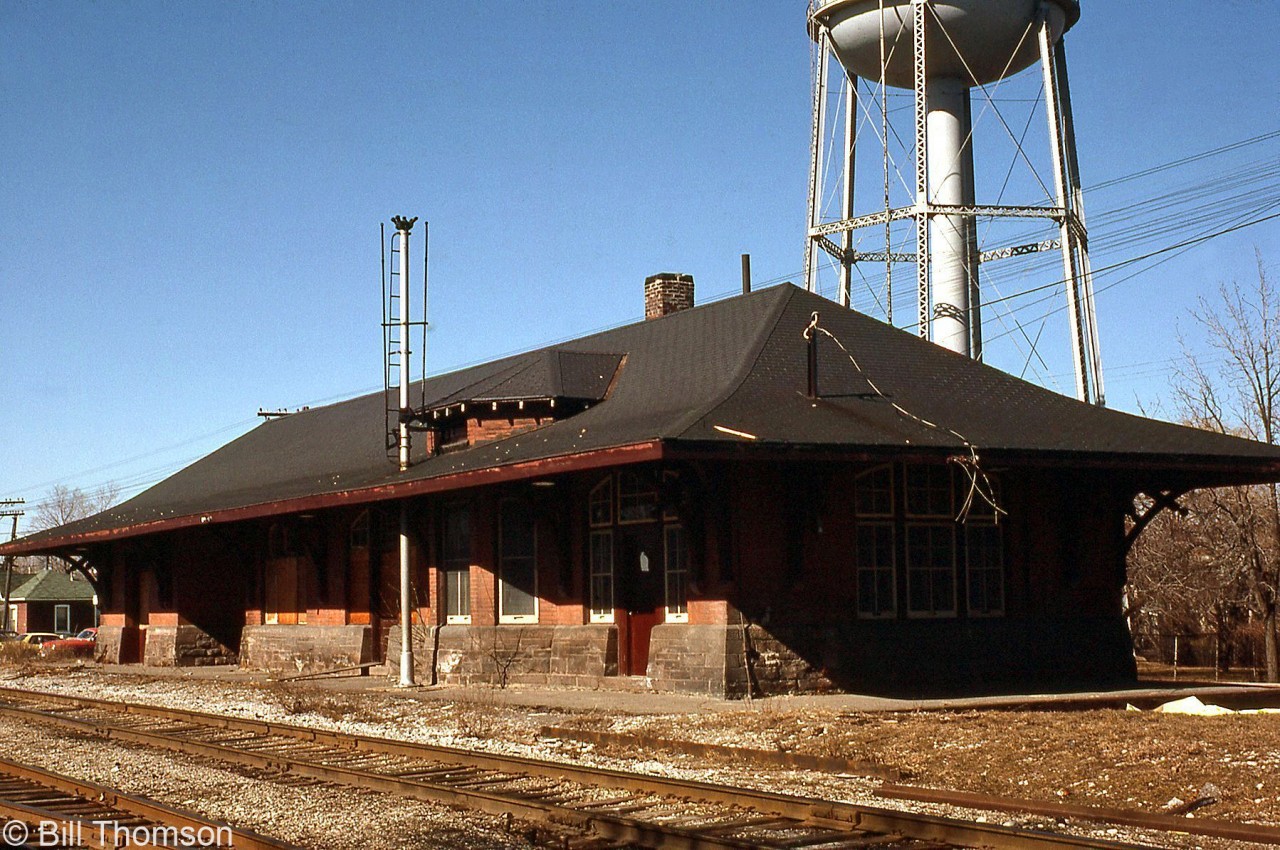 Canadian Pacific's Brampton Station is pictured in a state of disrepair, sitting on its original station site north of Queen Street on March 16th 1981.

Originally built in 1902, the last passenger train stopped here on November 30th 1970. The station was then closed and used as storage by CP, who applied to demolish it in 1977. The Brampton Heritage Board helped save it, and it was moved off-site in December 1981 to Hutton Nurseries (off Creditview Road). The property was sold in 1988 to build Lionhead Golf Course, and the station again languished in disrepair until property owner Kaniff Ltd planned to demolish the dilapidated heritage building the late 90's.

The city and heritage board then stepped in again, and the old station was dismantled by hand and moved to a resident's property in Norval where its pieces were stored. There were plans discussed in 2003 for it to become part of the new GO Transit Mount Pleasant station, but they ultimately fell through. The old station was eventually relocated and rebuilt in Mount Pleasant Village as part of the community centre in 2010, a stone's throw from the GO station.