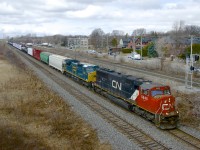 CN 310 with CN 5645 and GECX 7332 (still with a Seaboard sticker from CSX's 'heritage' program) heads east through Pointe-Claire. 