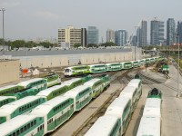 Their are a mixture of GO Transit colours as cab car GOT 330 brings up the rear of an equipment move heading east out of Willowbrook Yard.