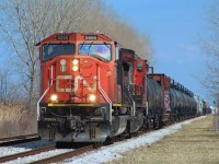 CN A439, making a rare daylight run, is hurrying into the city as Via 73 races directly behind him. Lately CN's trains to Windsor have begun to increase heavily in freight, with today's 439 being 102 cars long. These long trains have forced CN to send down much more interesting power, as last week's 438 had CN's 15th anniversary unit, 2124.