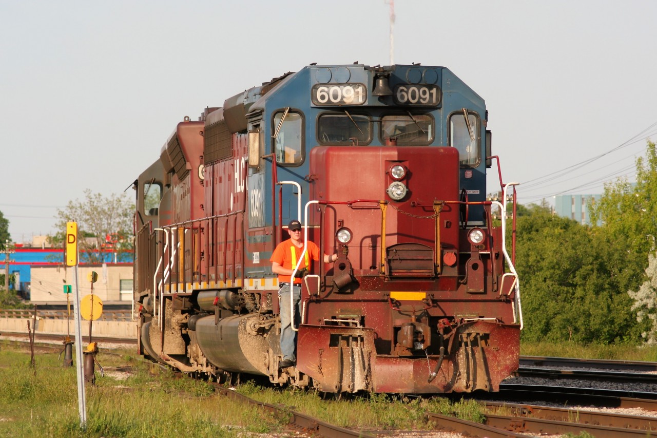 Goderich-Exeter Railway (GEXR) train 432 with HLCX SD40M-3 6522 and HLCX SD40-2CLC 6091 is seen backing into the east end of the Kitchener, Ontario yard to lift their blocked cars. HLCX 6091 is former CN SD40 5208.