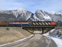 My first attempt to post a picture on this awesome board. :)

This westbound grain train was stopped on the siding near Henry House with no one onboard, not sure why. Jasper's yard was empty. Maybe mechanical issue, but a crew came in late evening and just left with it, so I don't know.  