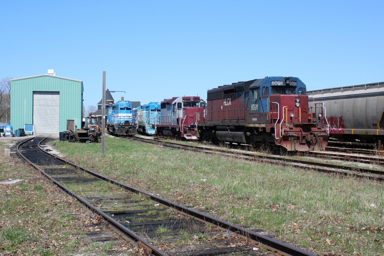 HLCX SD40-2CLC 6091 is seen along with several other stored and retired units at the Goderich-Exeter Railway’s shop at Goderich, Ontario. HLCX 6091 is former CN SD40 5208.