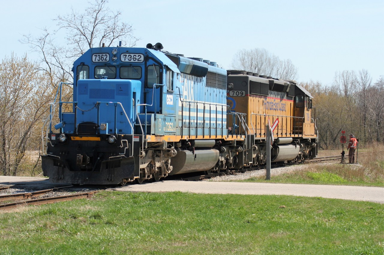 Goderich-Exeter Railway train 581 with borrowed Florida East Coast Railroad SD40-2 709 and GSCX SD40-2 7362 are seen building their train at Goderich, Ontario on a stunning spring day.