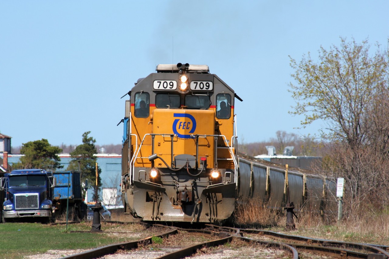 Goderich-Exeter Railway train 581 with borrowed Florida East Coast Railroad SD40-2 709 and GSCX SD40-2 7362 is seen returning to the yard in Goderich, Ontario after lifting a cut of salt hoppers from the Goderich harbor on April 11, 2010.