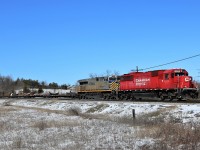 The empty windmill train lead by SD60, CP 6229 (former SOO 6029, with Citirail CREX 1350 heads eastward up to mile 37 and Canyon Road on the Galt sub. Interestingly enough I had to call the CP Police for the second last car of the trains brakes being stuck and smoking up a storm. The train was stopped in Milton for repairs. Rail fans do come in handy once in a while.