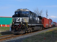 Ns-4043 AC-44C6M pulling a small convoy coming from US on Rouses Point Sub.on CN-route 529 going to Taschereau yard 
