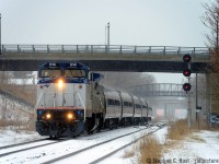 Back in 2001 I photographed one of these.. once.. on my 2 Megapixel crappy Point and Shoot camera, while I was on bike, and not only did I not know what I was looking at, I never shot one again. By the time I got serious into trains, I realised what I missed. 17 years later, I was able to make good on what I told myself - if one happens to run down this way I'll be sure to get it. (Heck, I've made trips down to the US and still didn't get one). Despite the storm, I and a gaggle of of others braved the cold to get this. Crossing fingers that this repeats - as units on the Maple Leaf do sometimes repeat on cycle.... and hopefully in better weather. I can't believe this is mid April! 

