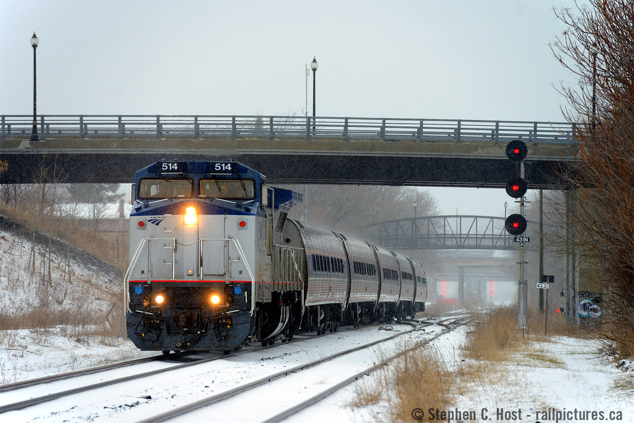 Back in 2001 I photographed one of these.. once.. on my 2 Megapixel crappy Point and Shoot camera, while I was on bike, and not only did I not know what I was looking at, I never shot one again. By the time I got serious into trains, I realised what I missed. 17 years later, I was able to make good on what I told myself - if one happens to run down this way I'll be sure to get it. (Heck, I've made trips down to the US and still didn't get one). Despite the storm, I and a gaggle of of others braved the cold to get this. Crossing fingers that this repeats - as units on the Maple Leaf do sometimes repeat on cycle.... and hopefully in better weather. I can't believe this is mid April!