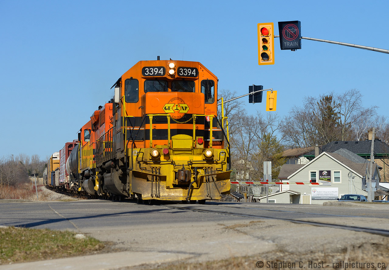 Train:  The sign says it all as GEXR 431 blasts their horn for downtown Baden, many residents are lined up to pick up a pie at Pizza Express just to the right of frame. The pizza must be good judging by the number of people going in and out in the 20 minutes I was there.