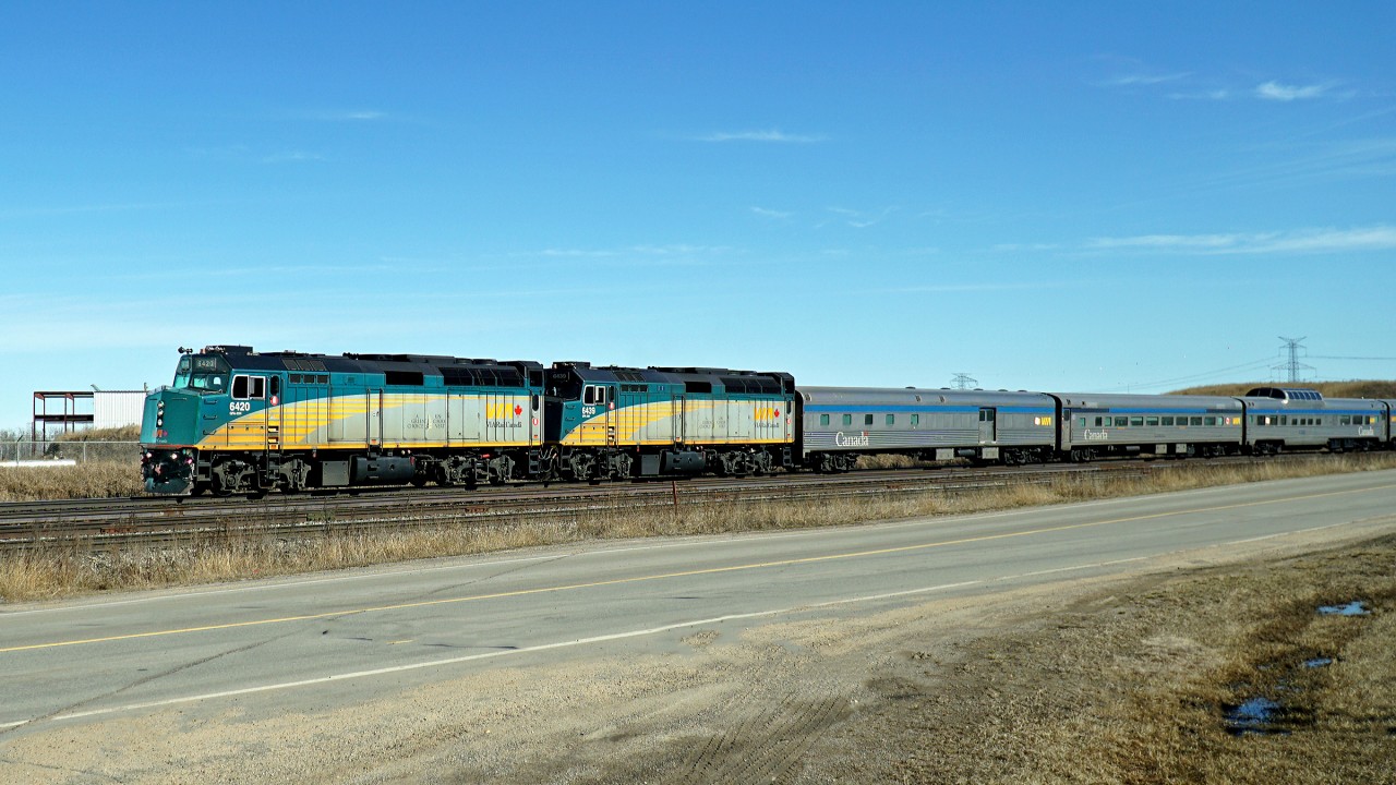 VIA #1 "The Canadian" running approximately 5 hours late is piloted through Clover Bar by VIA  6420 and 6439
