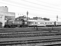 CP 7020 is moving a CP train at the Toronto Union Station in Toronto in June 1972.