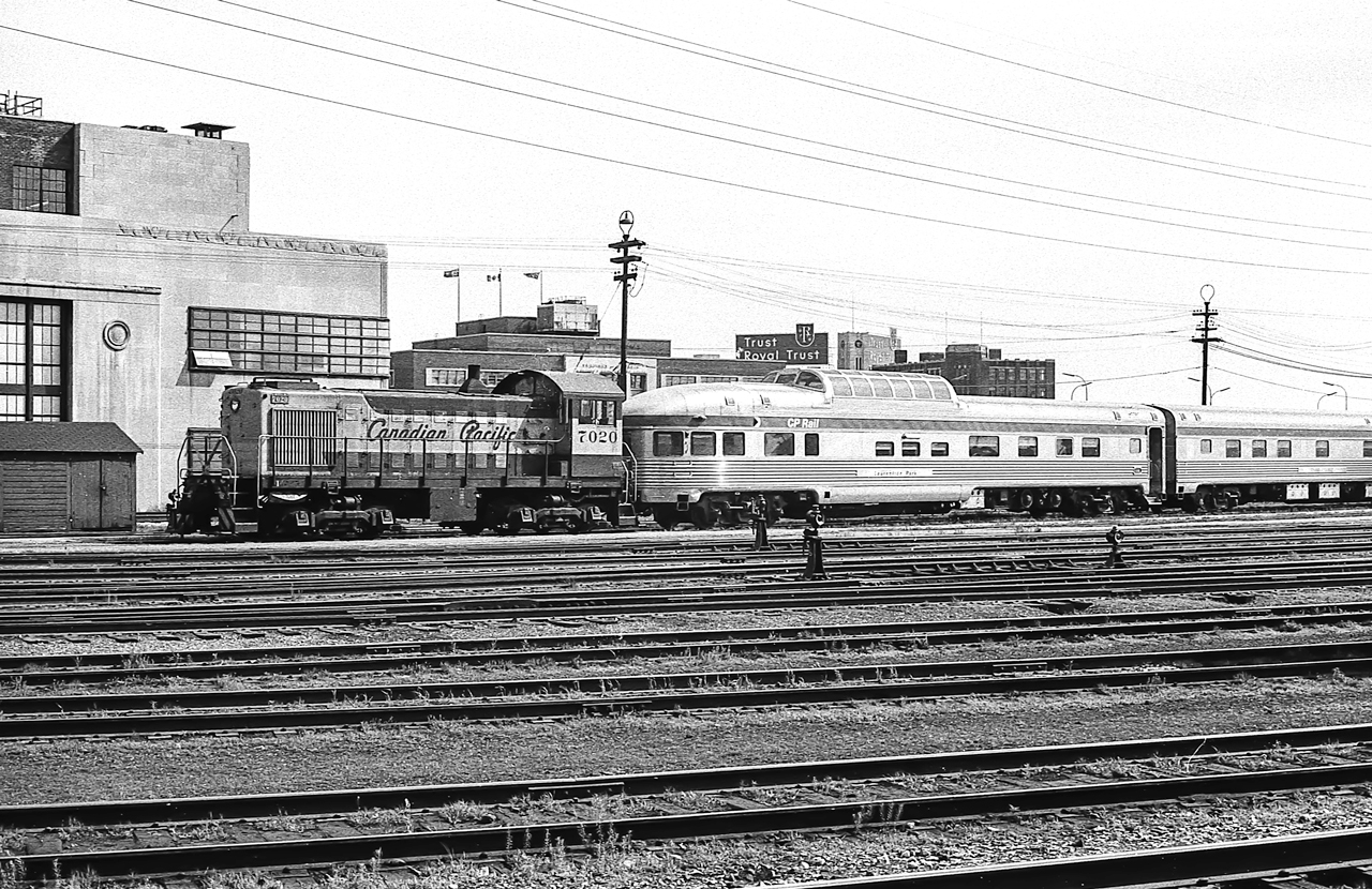 CP 7020 is moving a CP train at the Toronto Union Station in Toronto in June 1972.