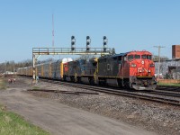 The weather is getting warmer, the days are filled with sunshine and it feels like spring has finally arrived in Southern Ontario! While the trees start to bloom and flowers blossom, CN has really been providing some colour of their own. Here, CN train no. 435 cruises through Paris with a grab-bag consist while some locals head towards the fishing ponds on a lovely May afternoon. 