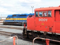 At the time of this photo CP 9001 was about a month away from being sent out for scrapping while SSRX 6076 a former DM&E unit and originally CP 5557 gets a new lease on life with S&S shortline.
