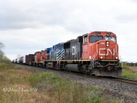 CN 5757 with CFEX 1014 and a couple of off line units trail Train 509 out of Sarnia heading back to London, ON.