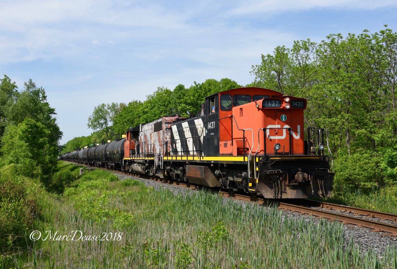 CN 1437 with CN 4774 head southbound out of Sarnia servicing the TERRA Industries/NOVA Chemicals jobs down river.