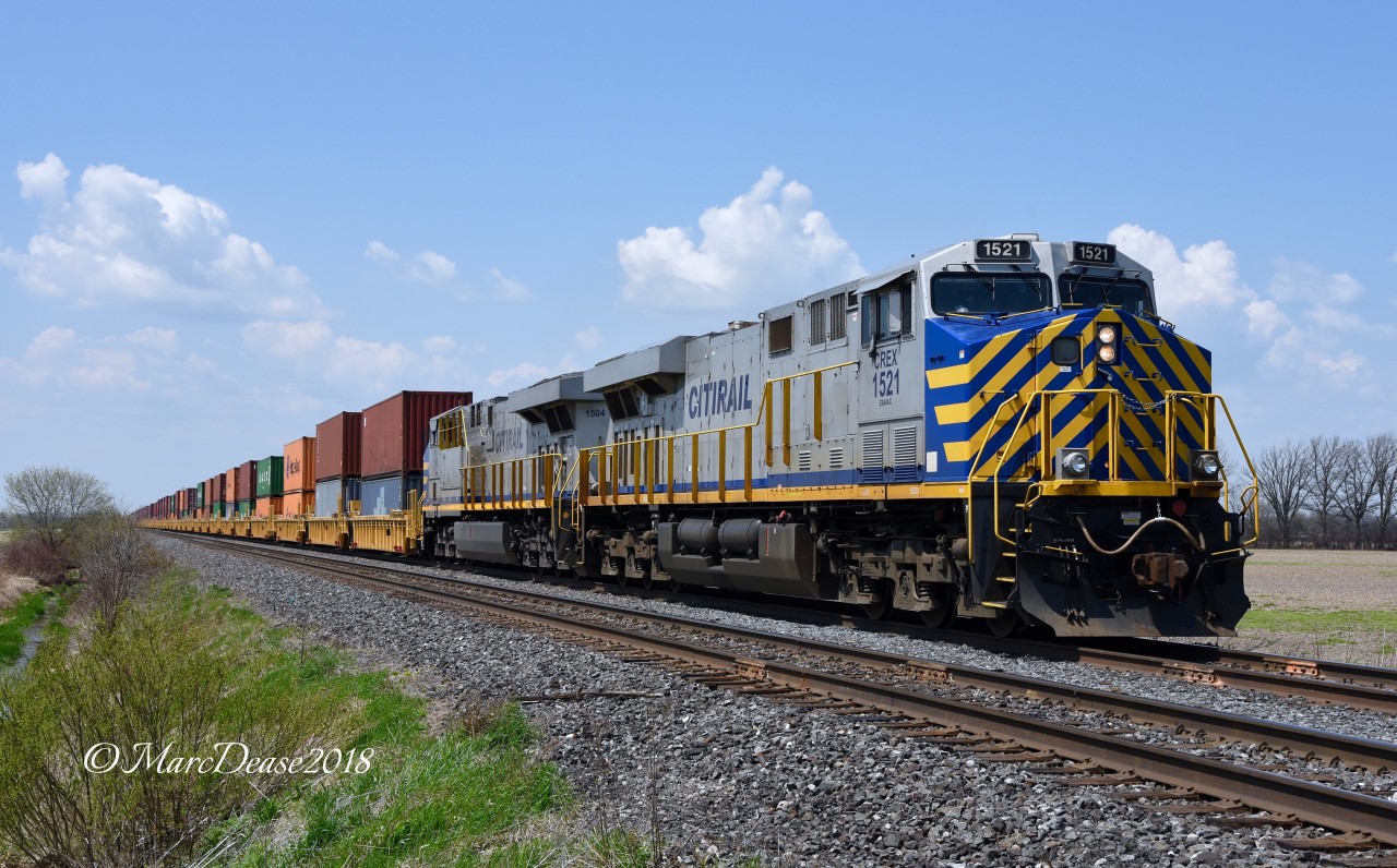 Double CREX power on Train 148 out of Sarnia today. CREX 1521 with CREX 1504 cross Waterworks Sideroad east bound.