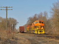 One thing I'll miss about the orange come November is the pop of colour it gives in the morning/late evening sun.  Light power for the trip to Mac Yard, 432 scoots through Guelph on a sunny Easter Monday.  The GP40-2LW, finest looking of the GEXR power, leads the way into the rising sun.  